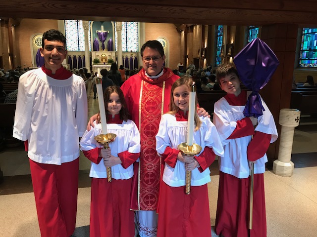 Fr. Ruben and altar servers on Palm Sunday