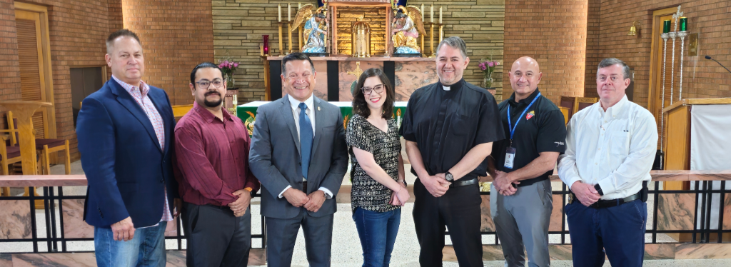 Our Lady of Sorrows Catholic Church | Diocesan Employees with Fr. Ruben and Mario Vigil, Dep. Dir. of Special Programs for the TN Dept. of Safety and Homeland Sec.